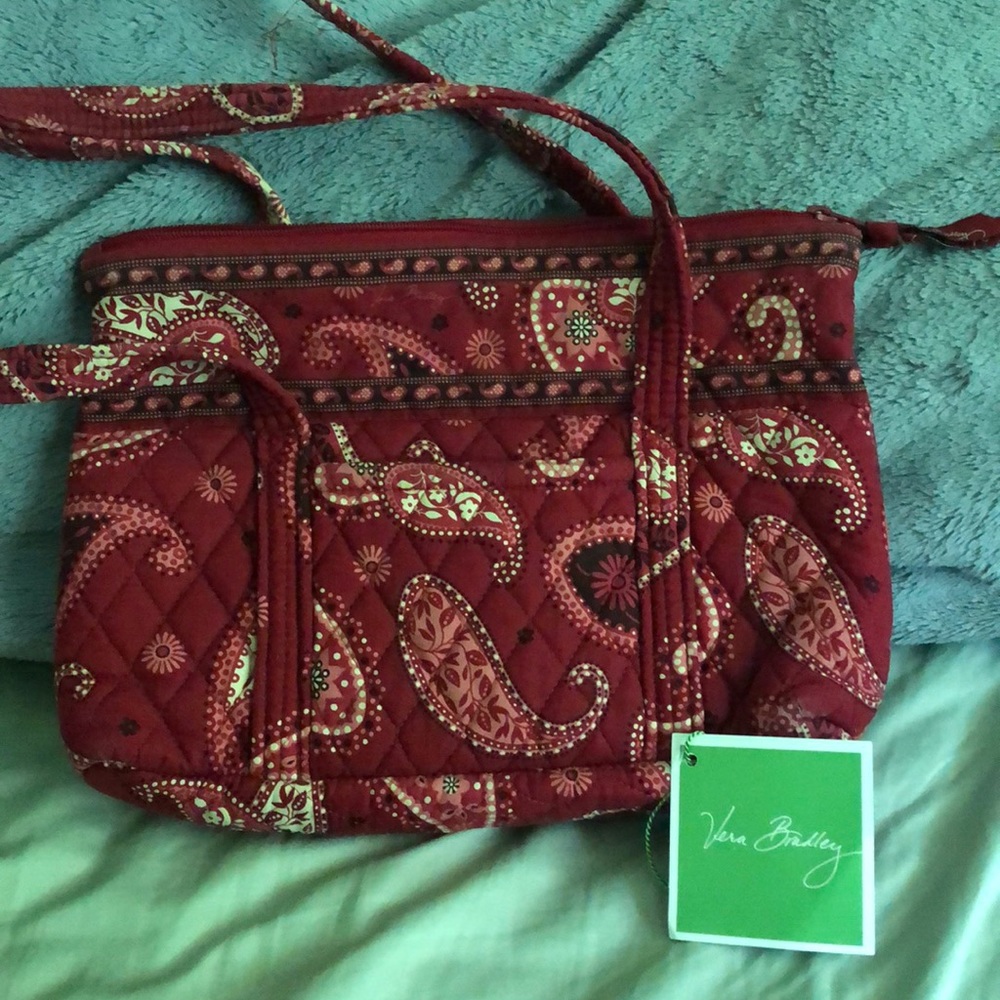 Red Vera Bradley small purse with paisley print.